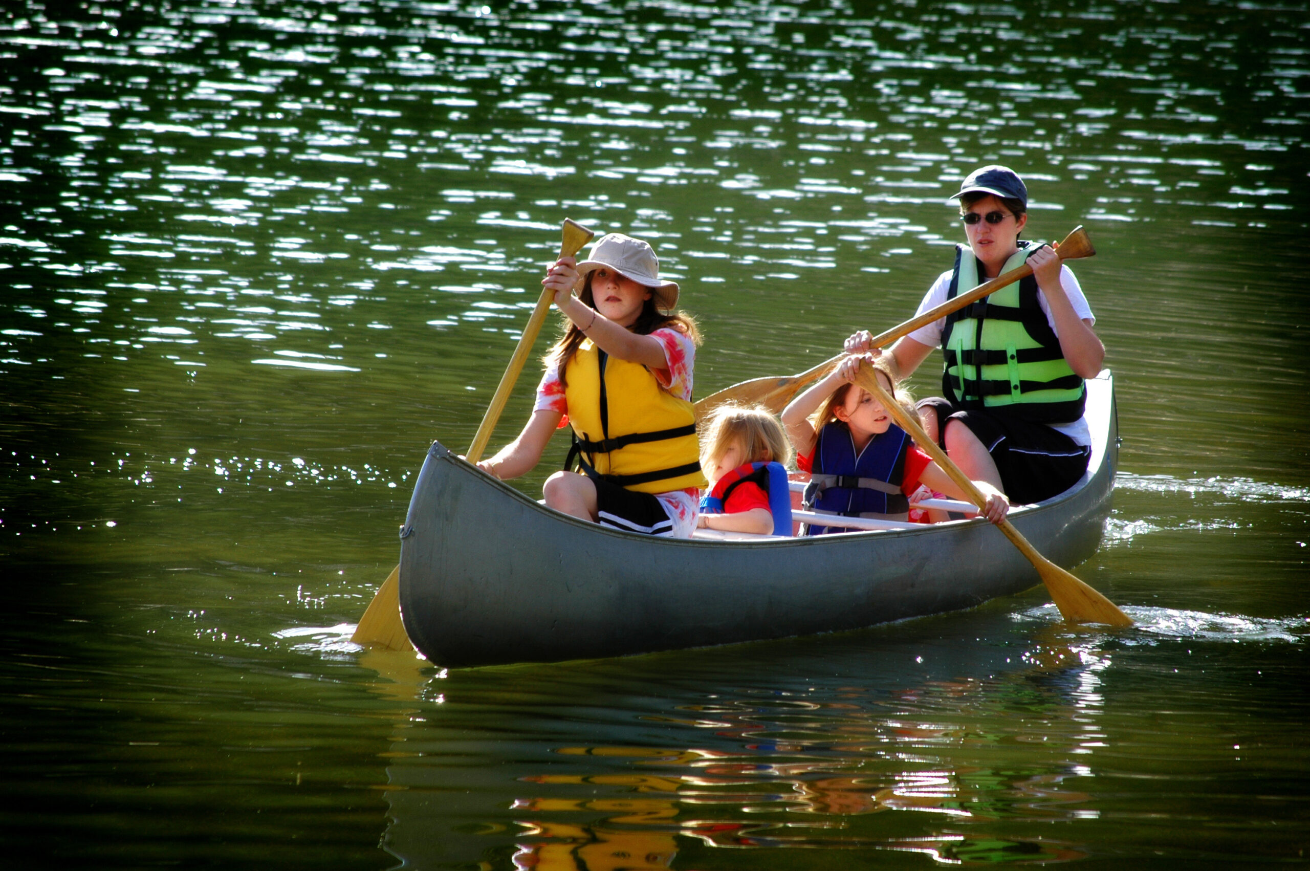 A family sharing a canoe. Kayaking and Canoeing tips 101