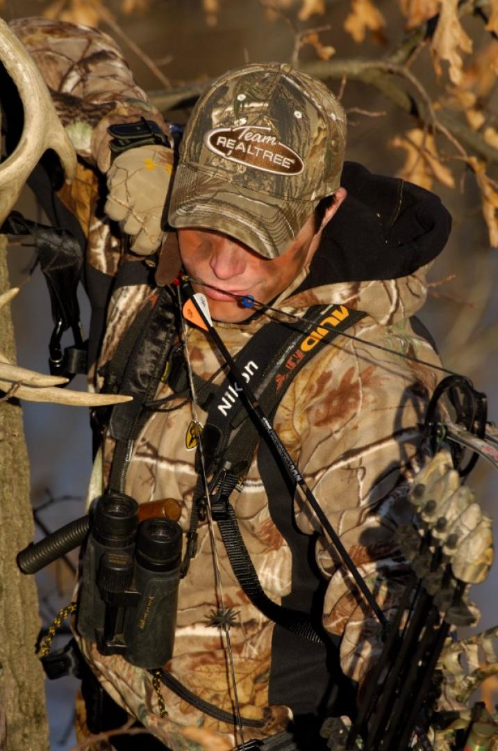 Hunter drawing bow string bow hunting