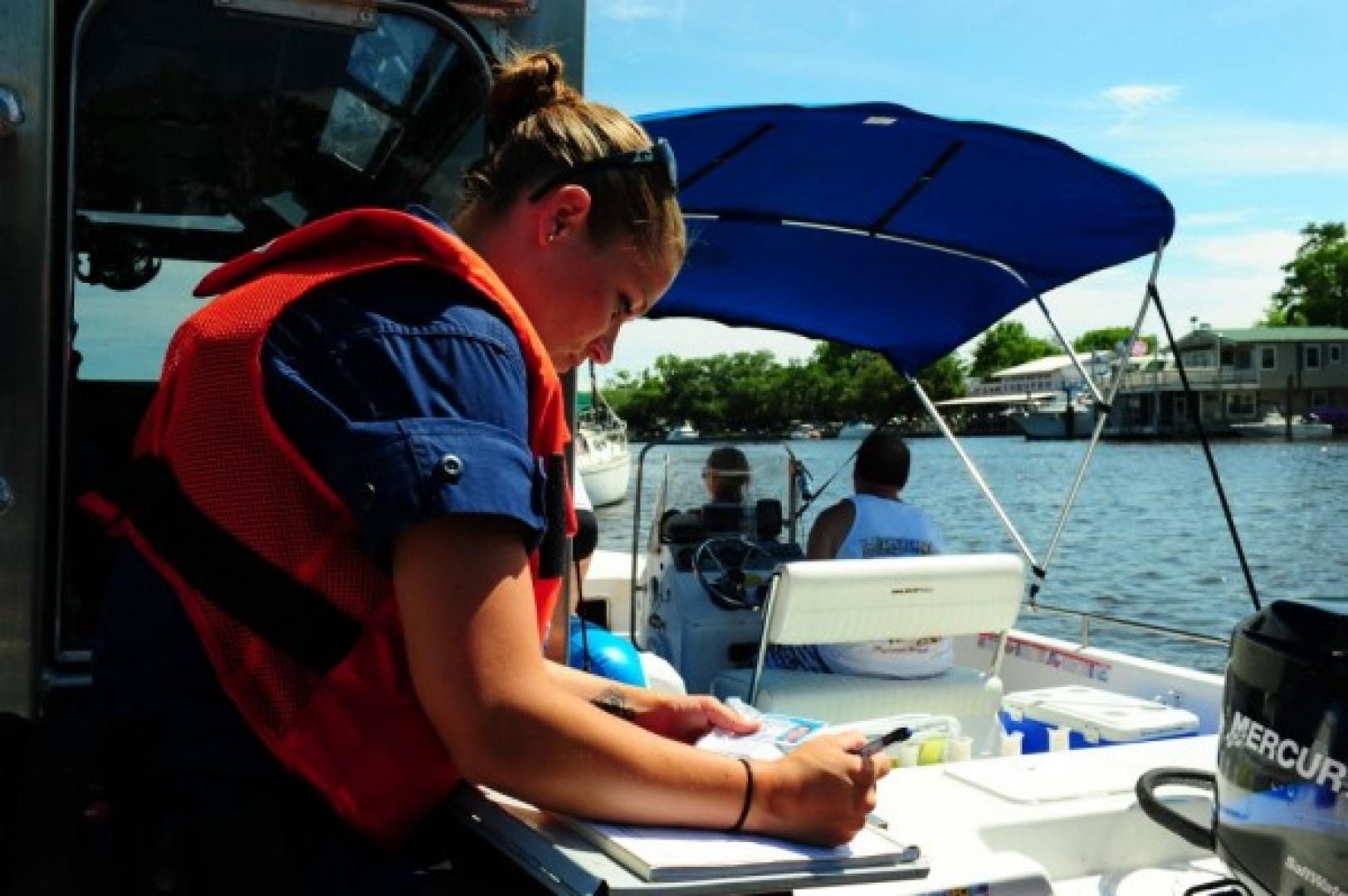 Woman in boat 5 Boating Tips for a Perfect Day on the Water